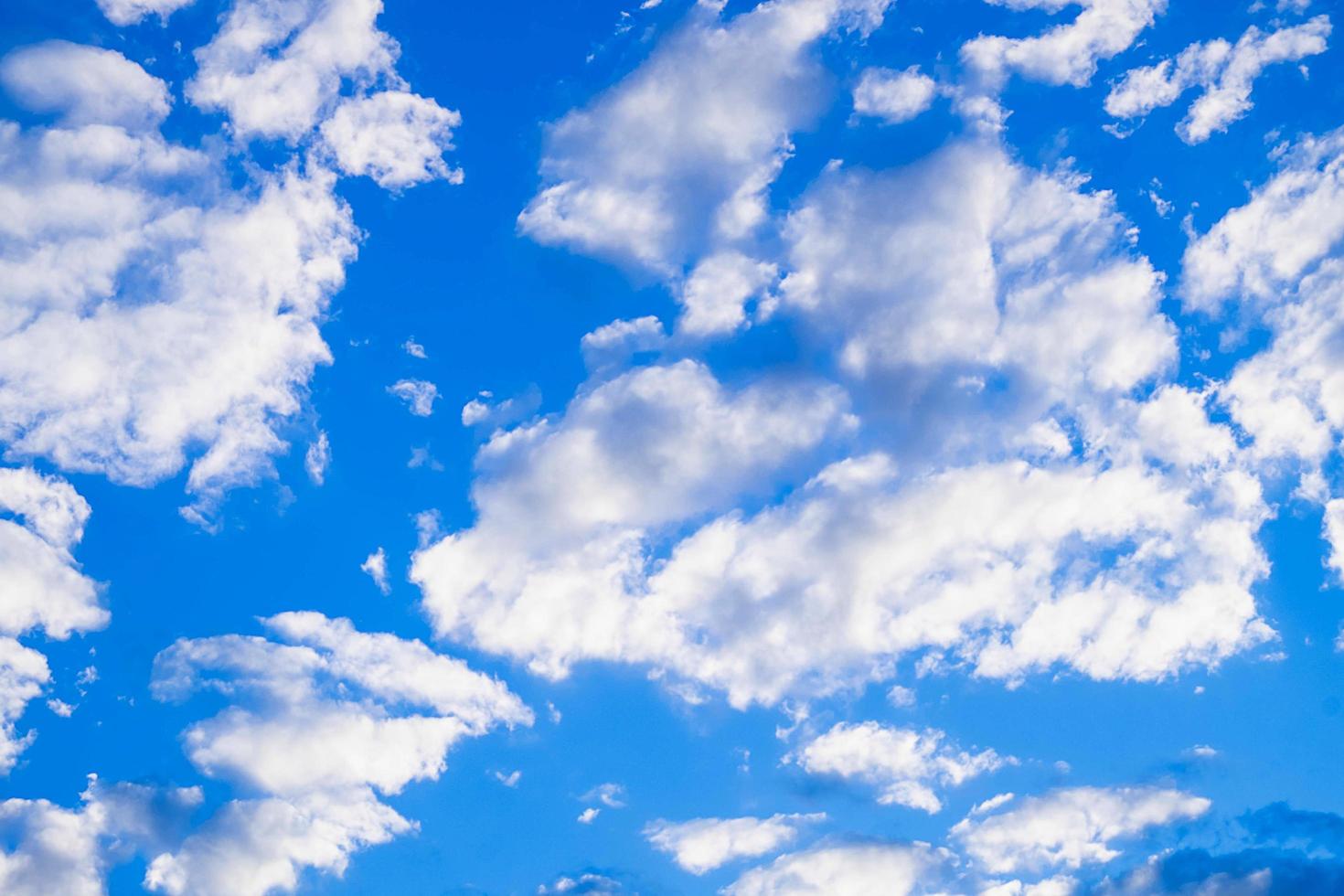 Fluffy white clouds photo