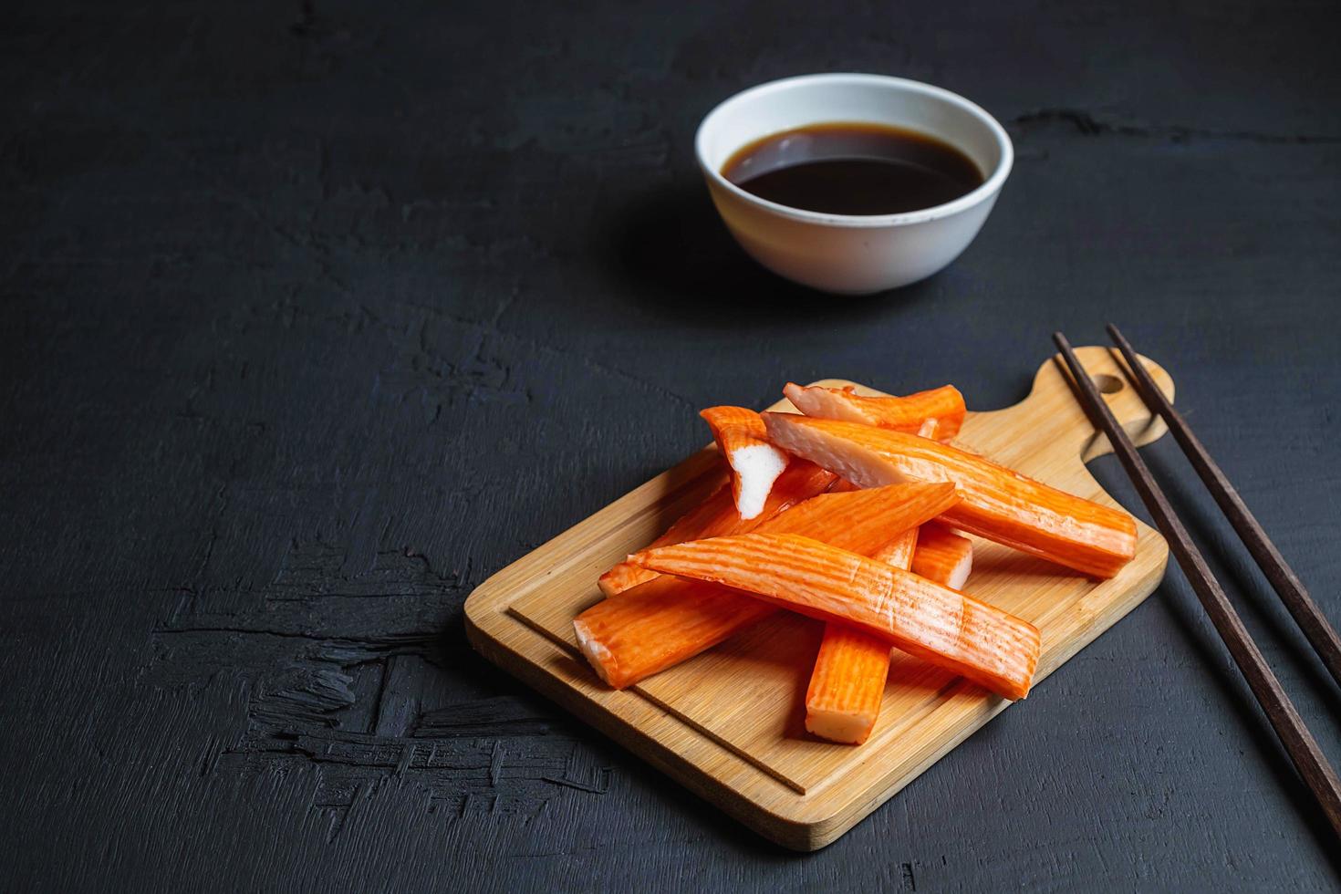 Crab sticks on a board photo