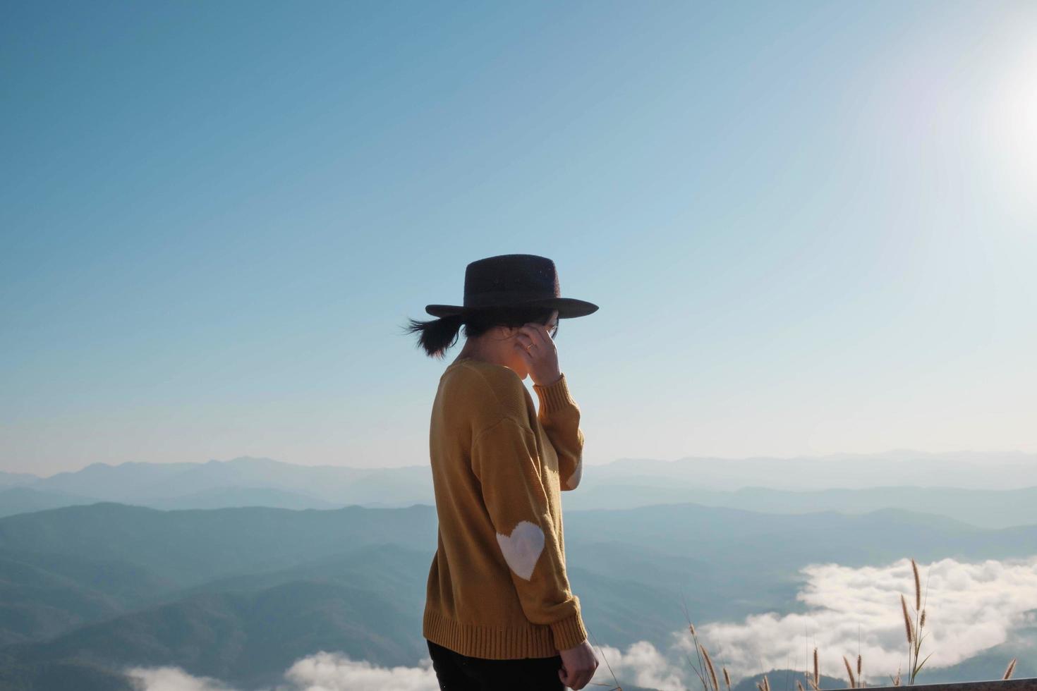 Woman on a mountaintop photo