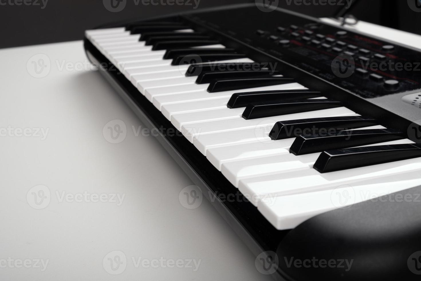 Keyboard on a white table photo