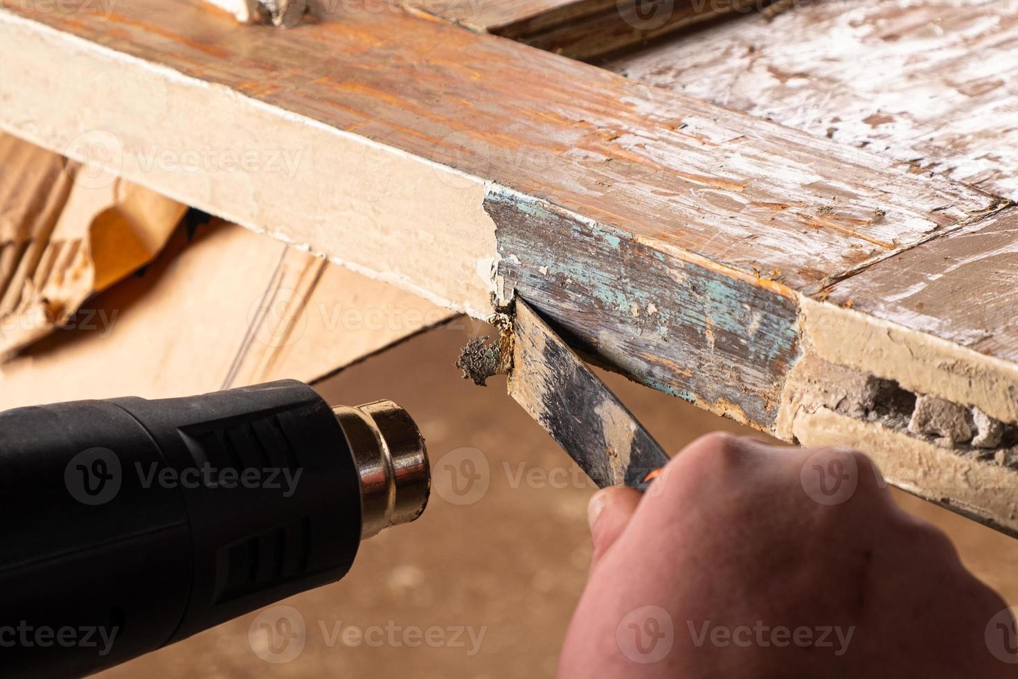 Removing paint from doors 2182922 Stock Photo at Vecteezy