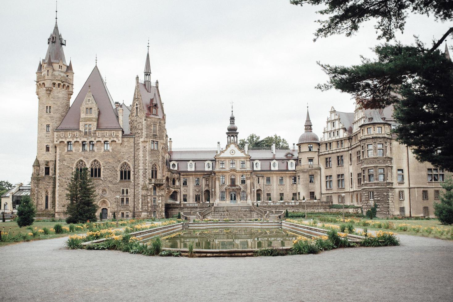 Moszna, Poland 2017- Old Polish castle in the village of Moszna photo