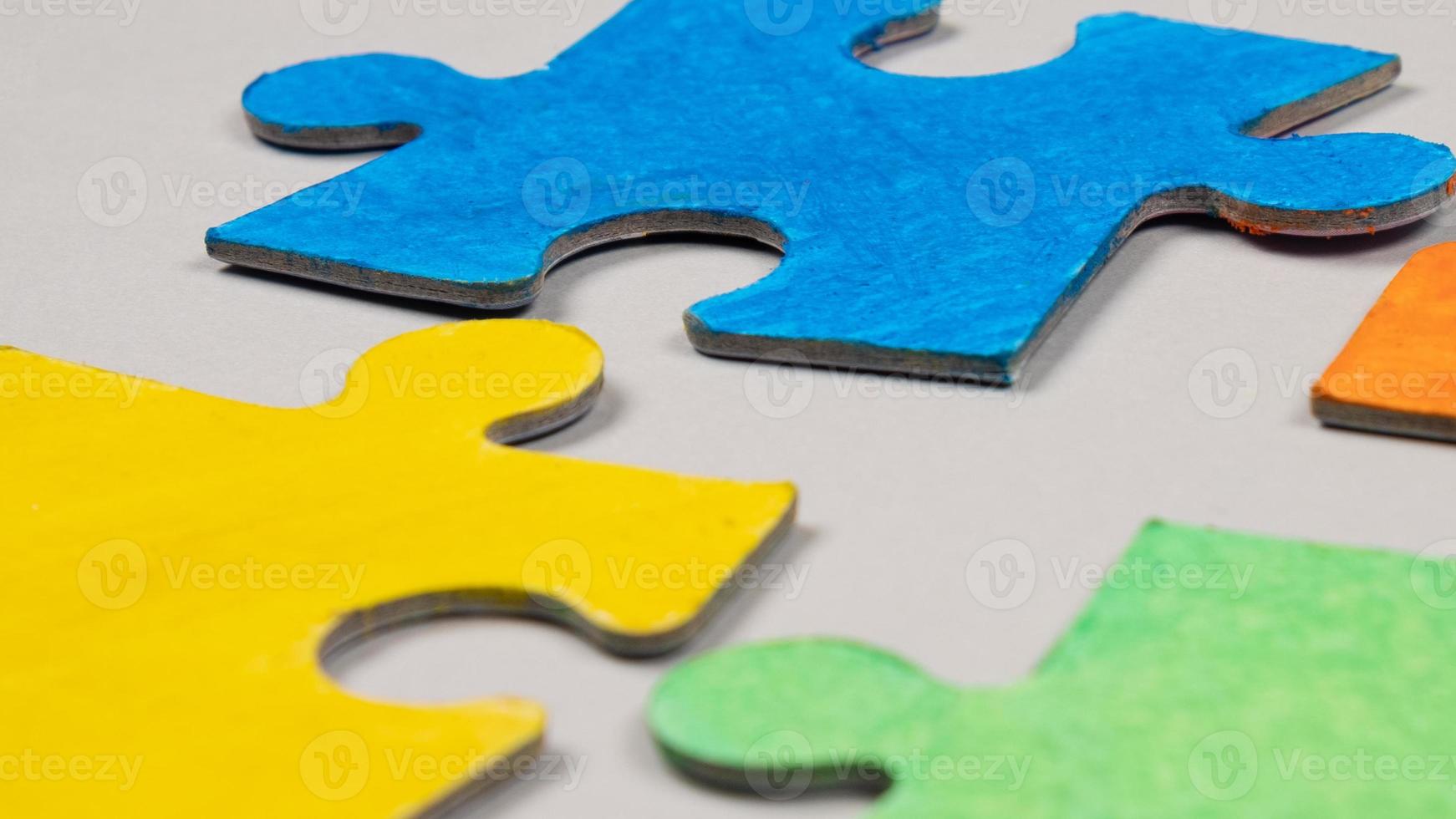 Close-up of colorful puzzle pieces photo