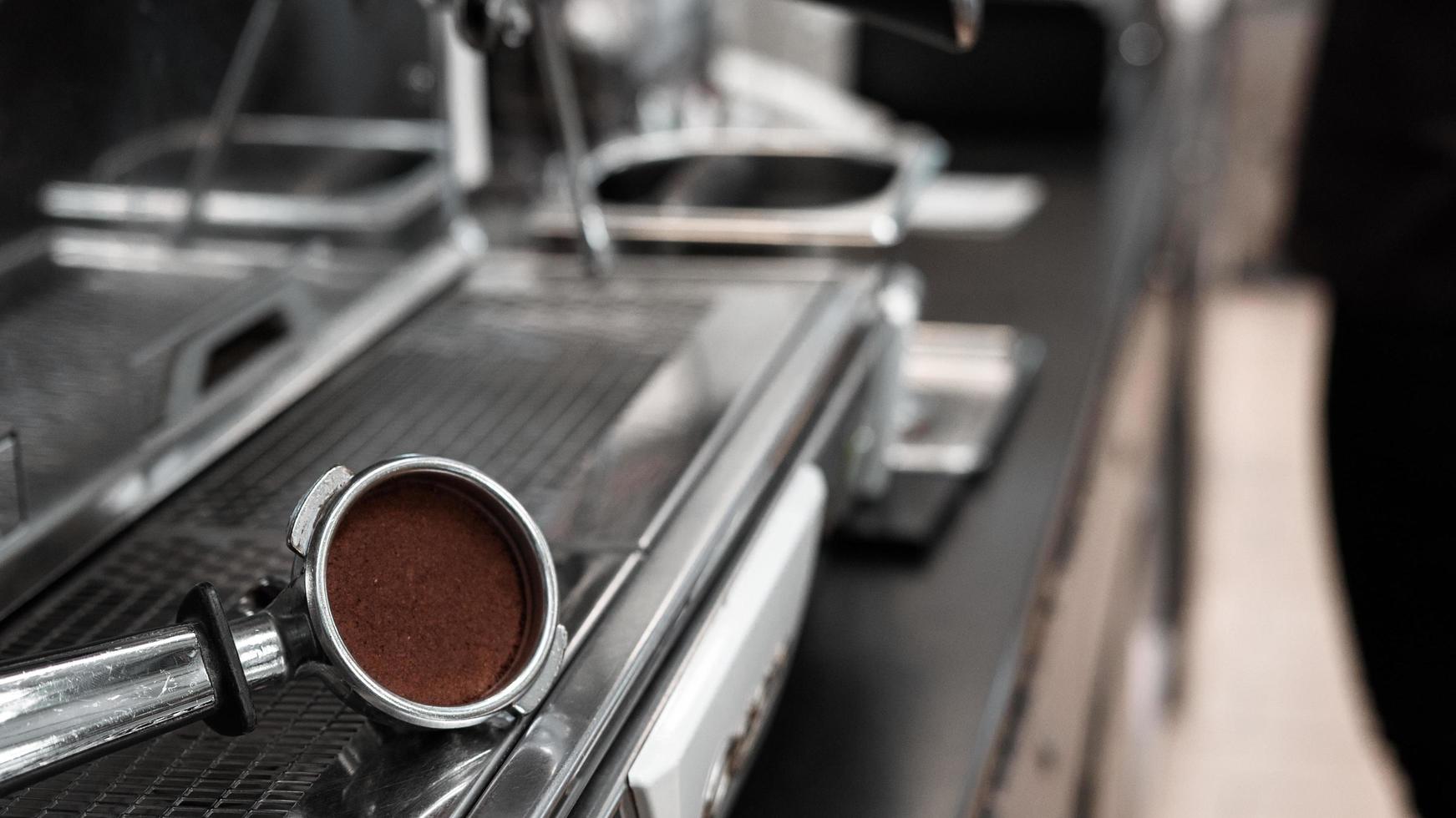 Coffee tamper on coffee machine 2186980 Stock Photo at Vecteezy