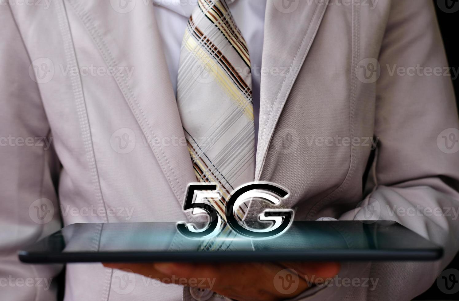 Businessman holding tablet, 3D technology networks concept photo