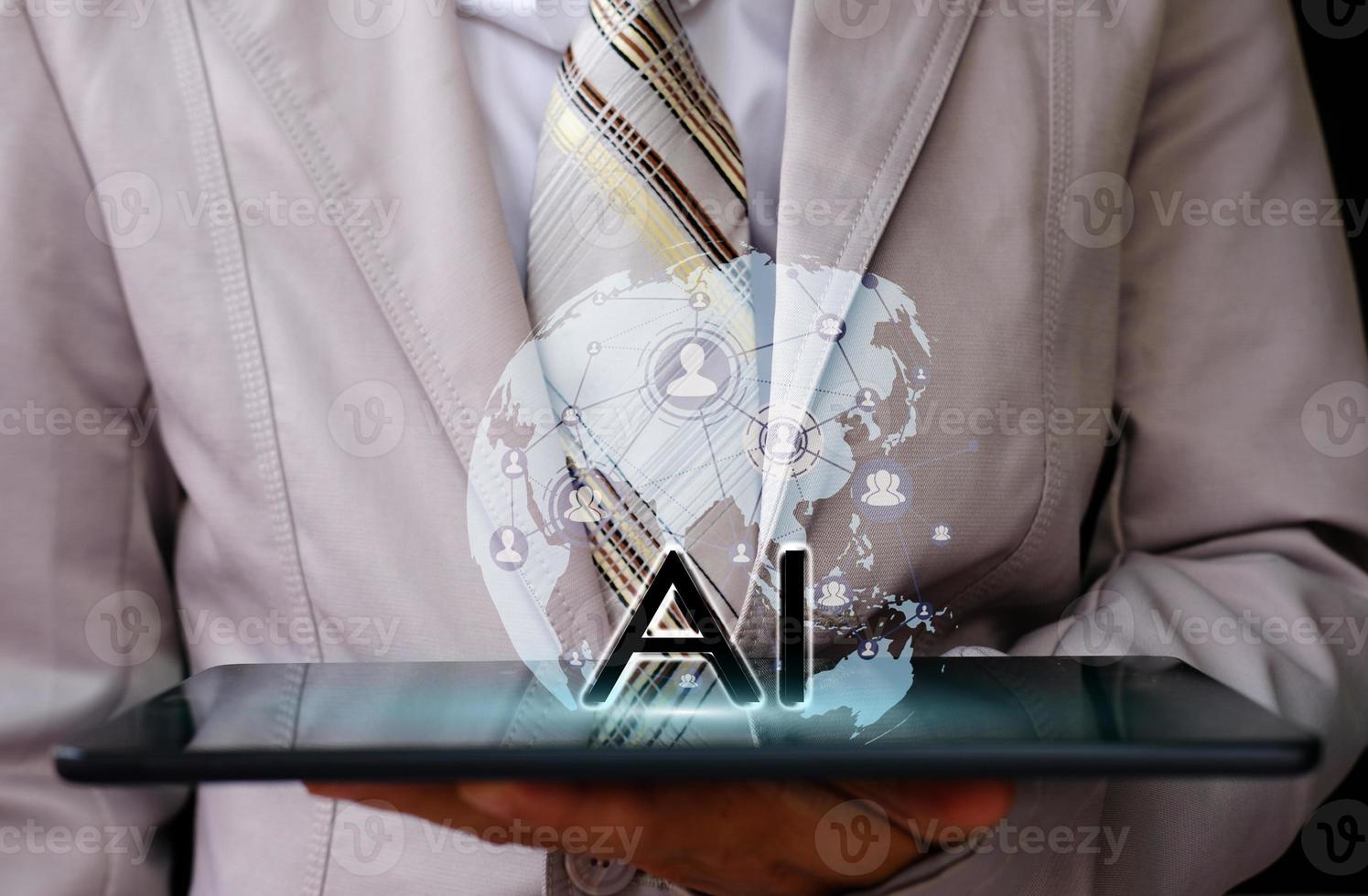 Businessman holding tablet and technology network concepts photo