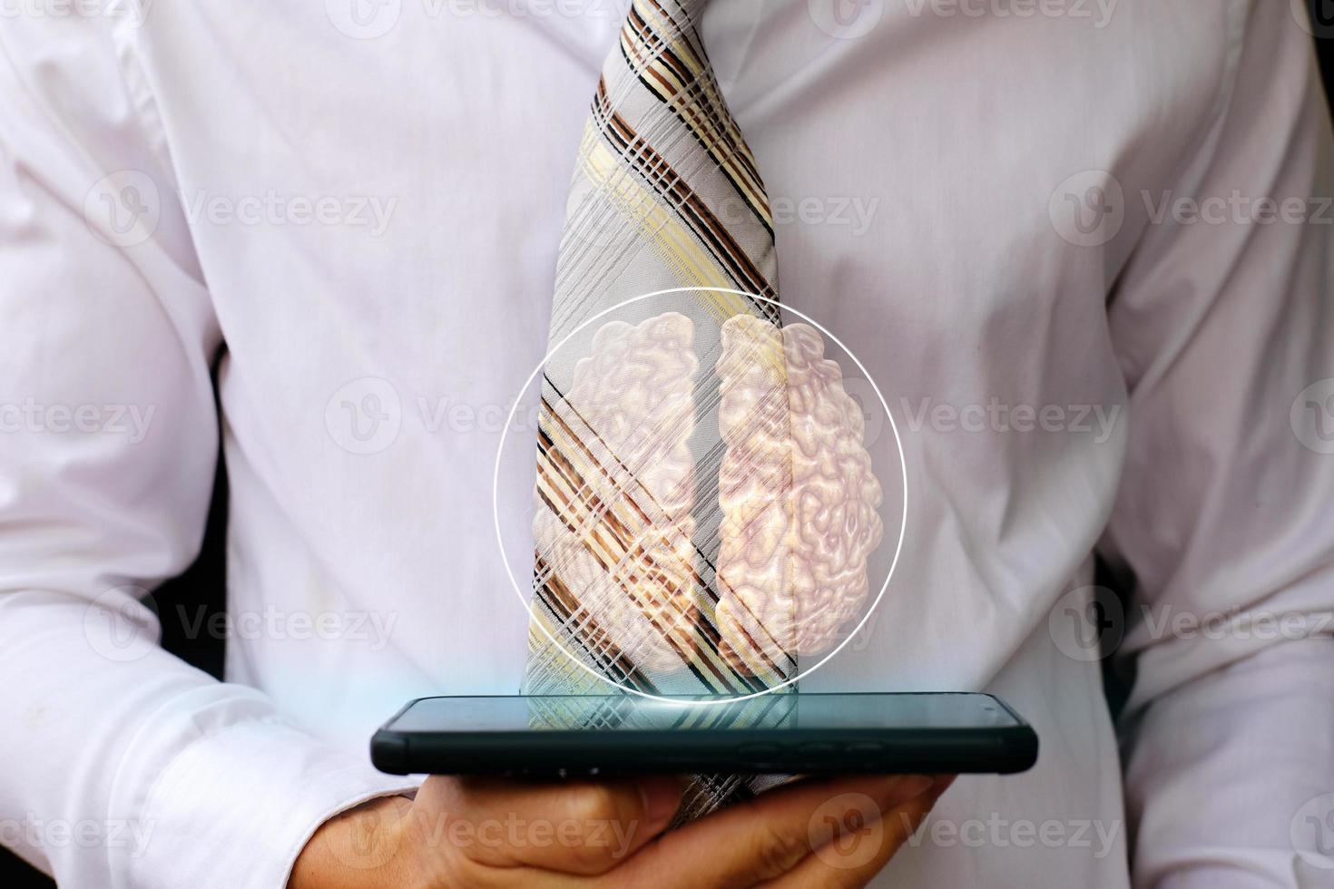 Businessman using a smartphone and technology network concepts photo