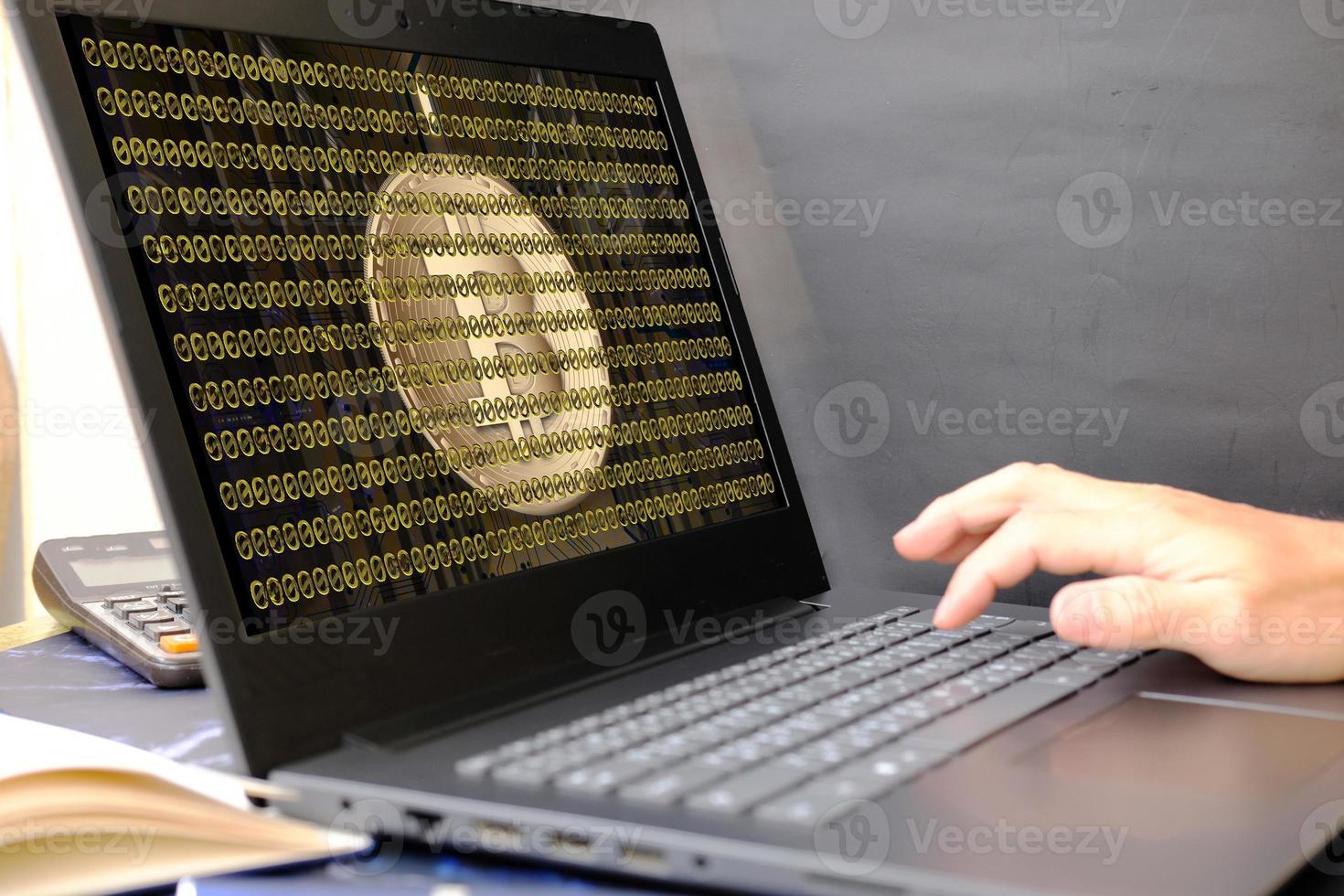 Bitcoin cryptocurrency coin and euro coin on laptop screen, concept photo