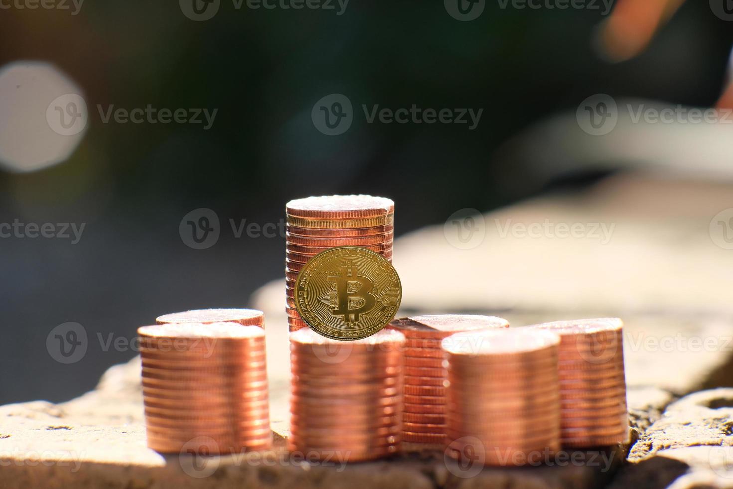 Bitcoin cryptocurrency coin and euro coin on table photo