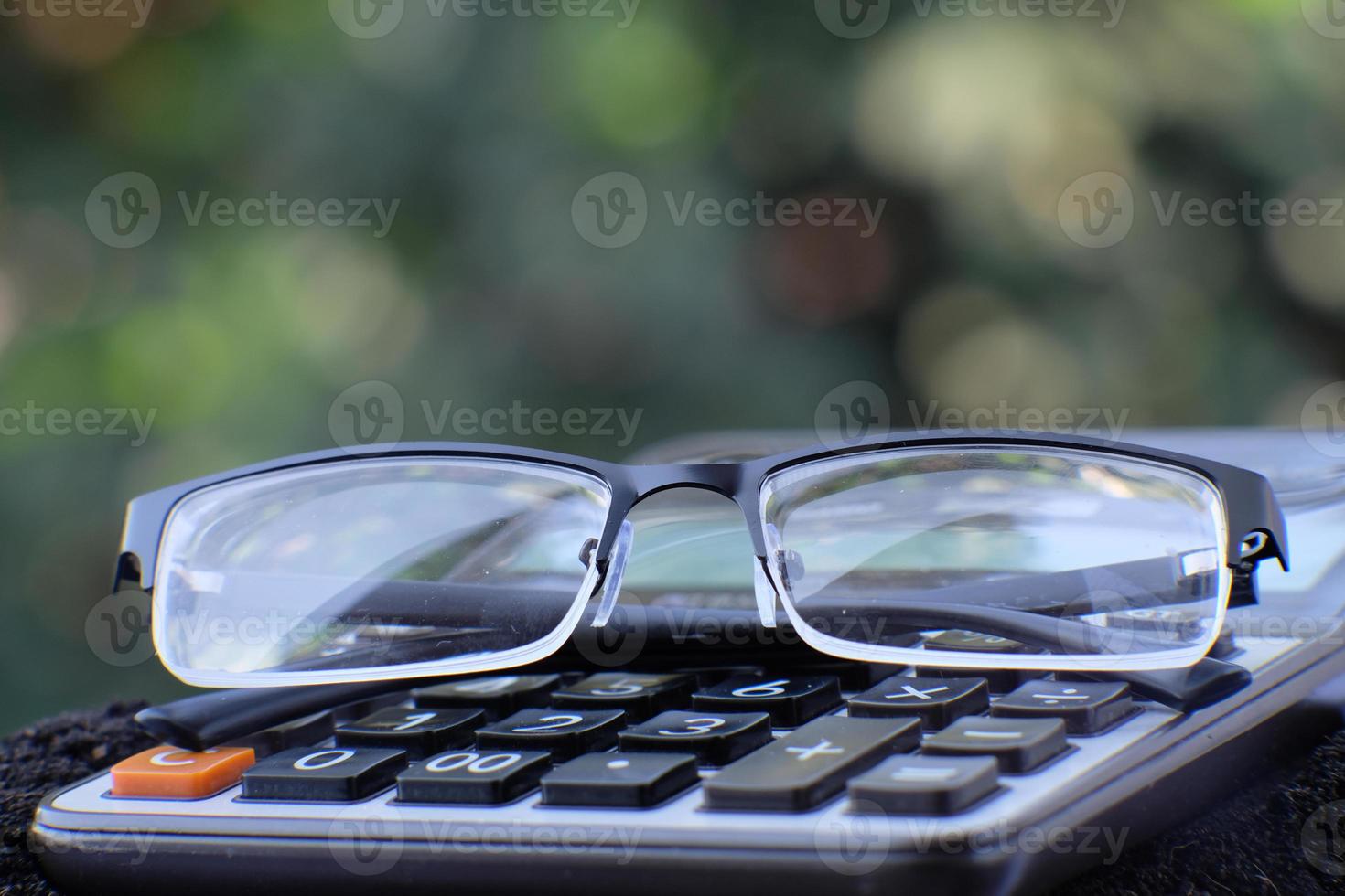 Close-up calculator on table and business concept photo