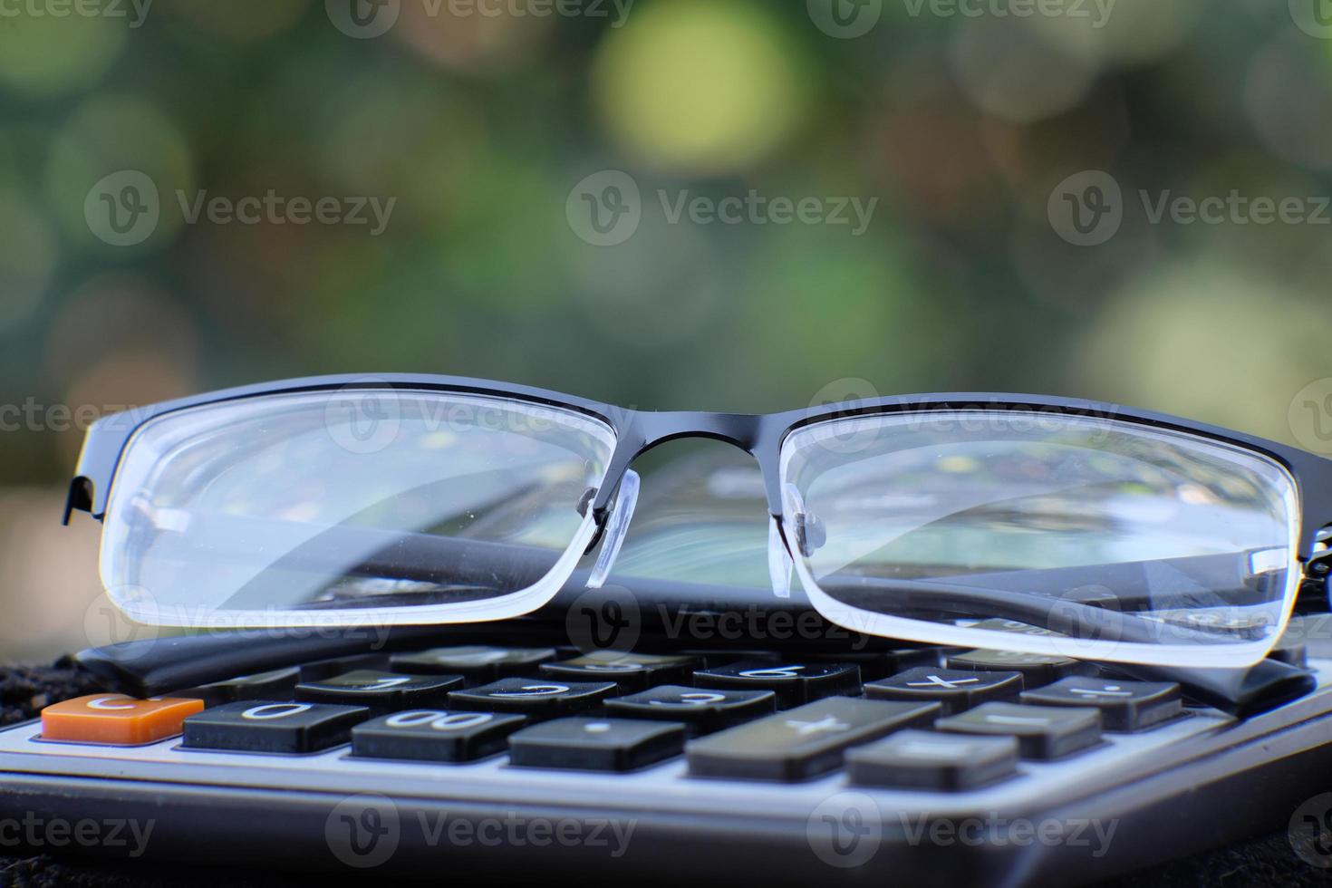 Close-up calculator on table and business concept photo