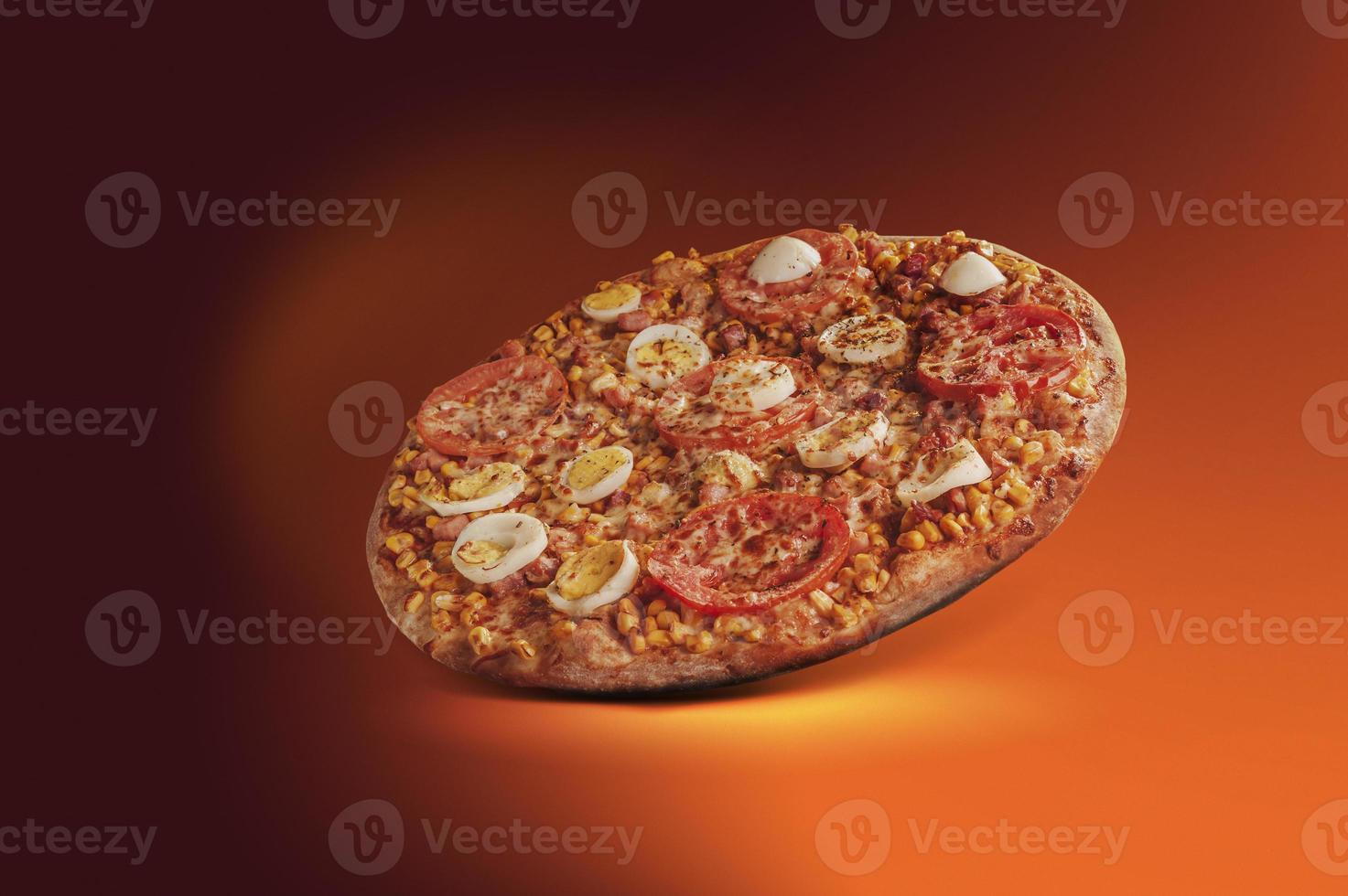 Brazilian pizza with mozzarella, corn, bacon, eggs, tomato and oregano photo