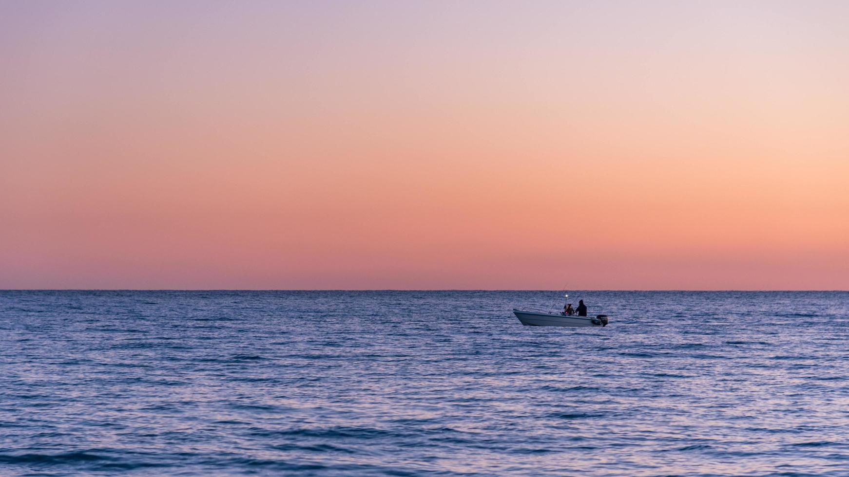 Sunset on the Bay of Angels in Nice, France photo
