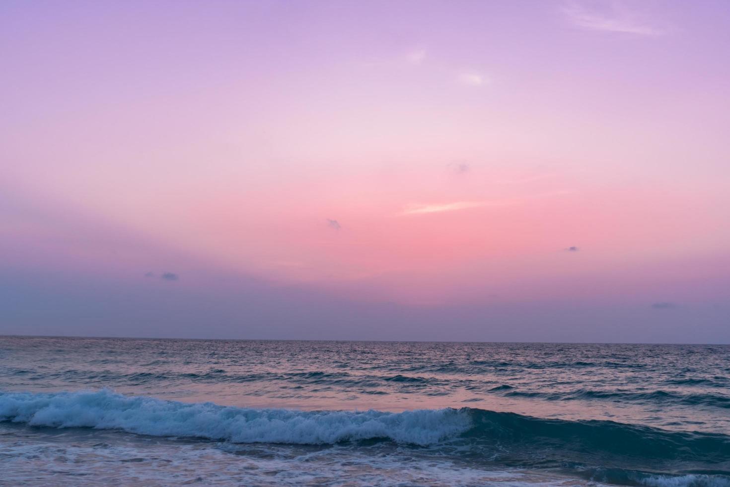 Colorful vibrant ocean sea waves at the beach during summer photo