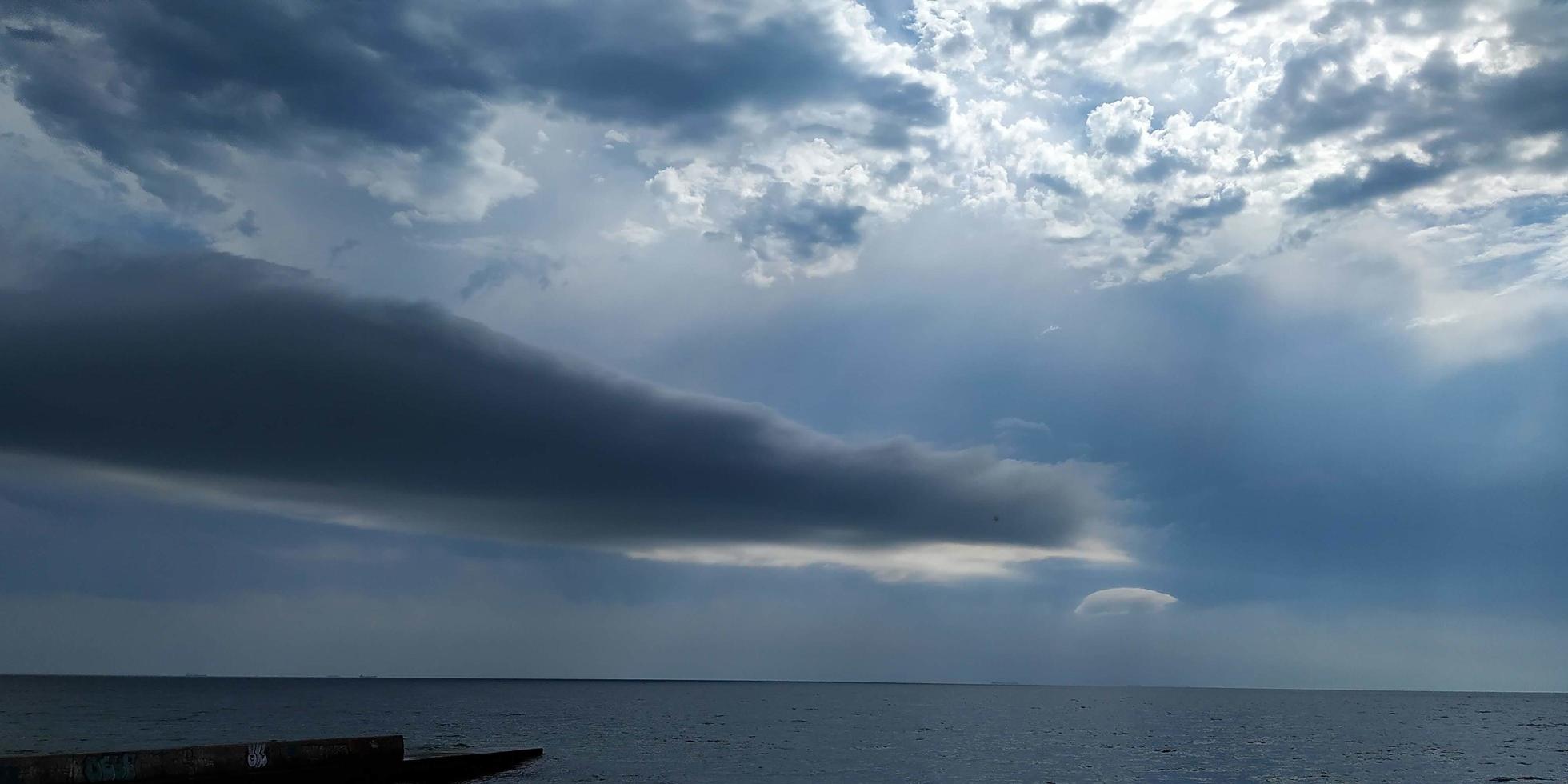 Storm clouds over the sea photo