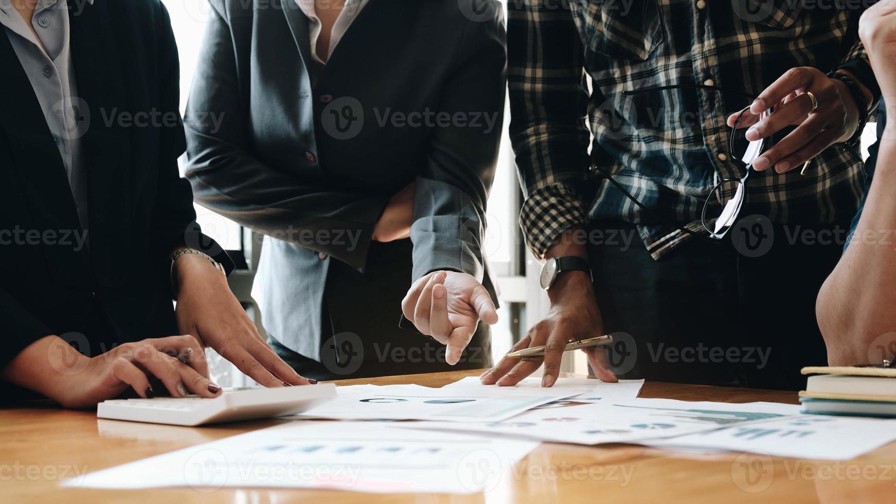 Close-up of a group of people in a meeting photo