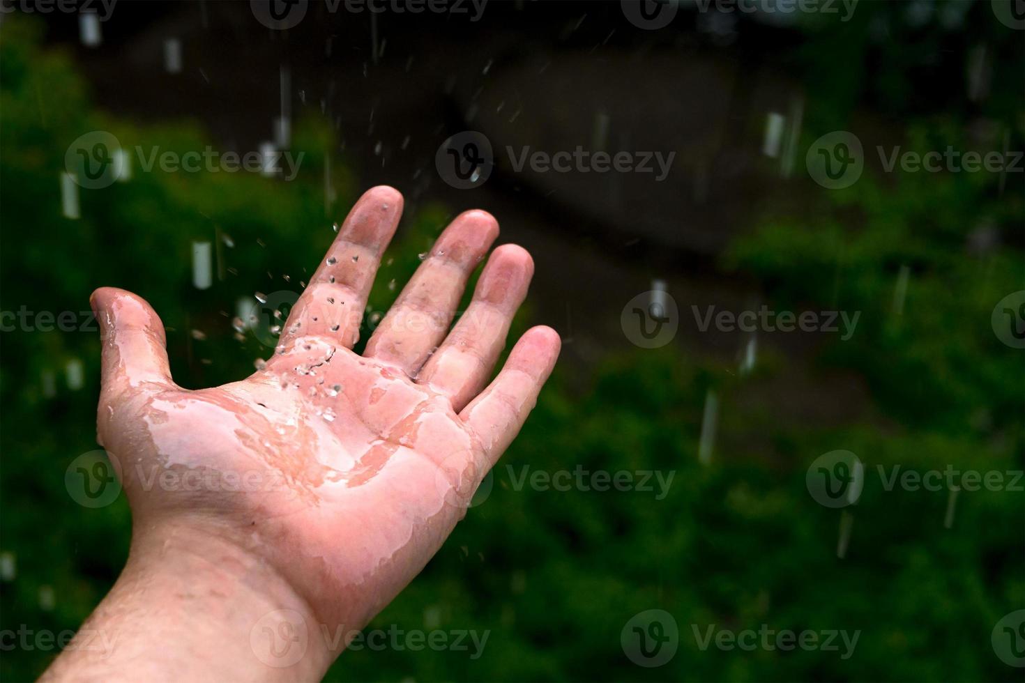 Splashing droplets on a hand photo