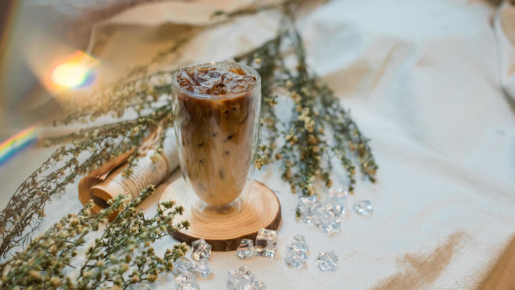 Iced latte and flowers photo