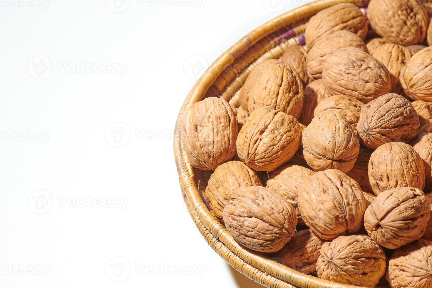 Basket of walnuts isolated photo