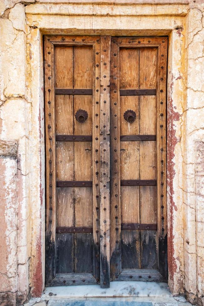 Antique rustic ancient wooden door photo