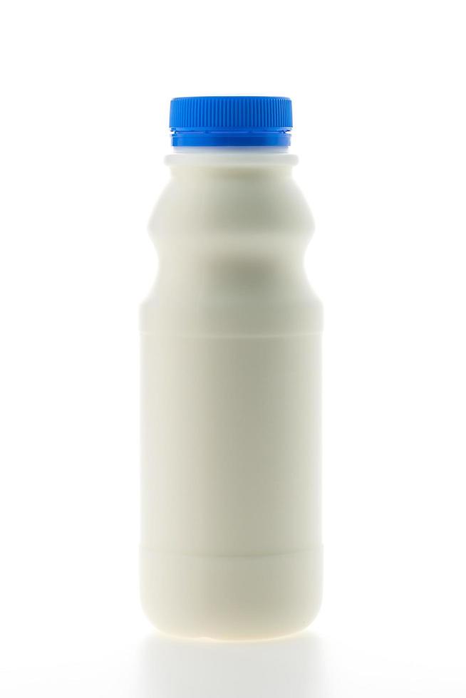 Milk bottle isolated on white photo