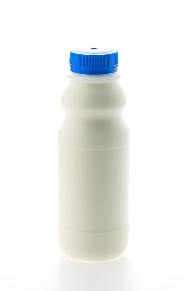 Milk bottle isolated on white photo