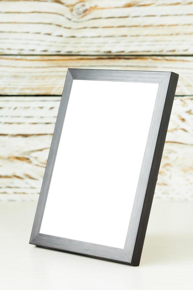 Frame on wood table photo