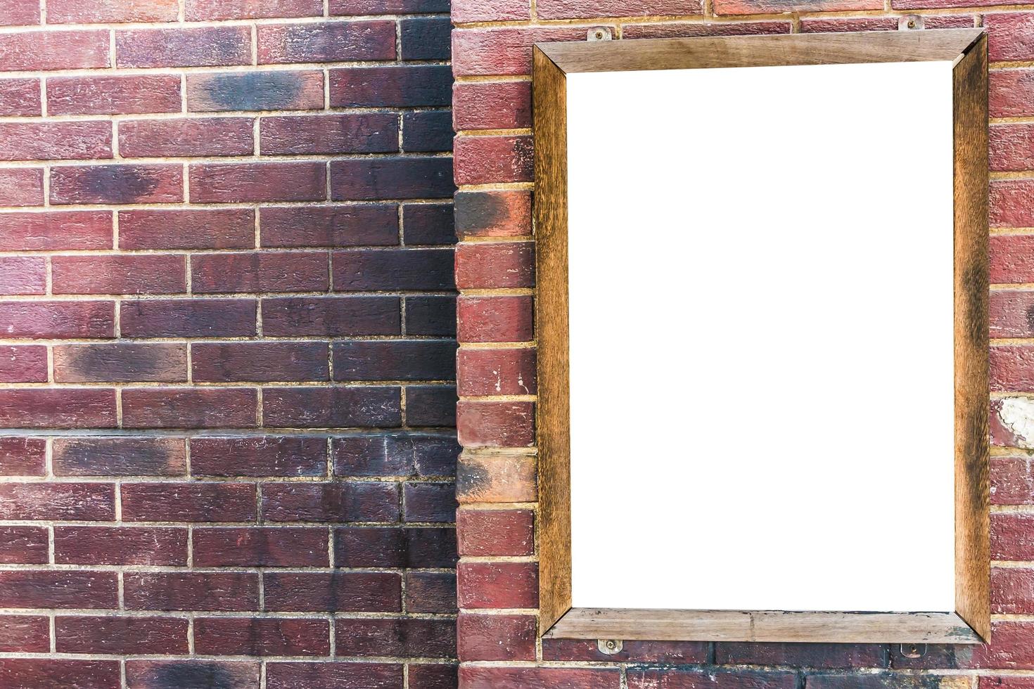 Advertising blank sign on brick wall photo