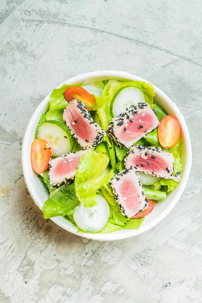 Grilled tuna salad in white bowl - healthy food photo