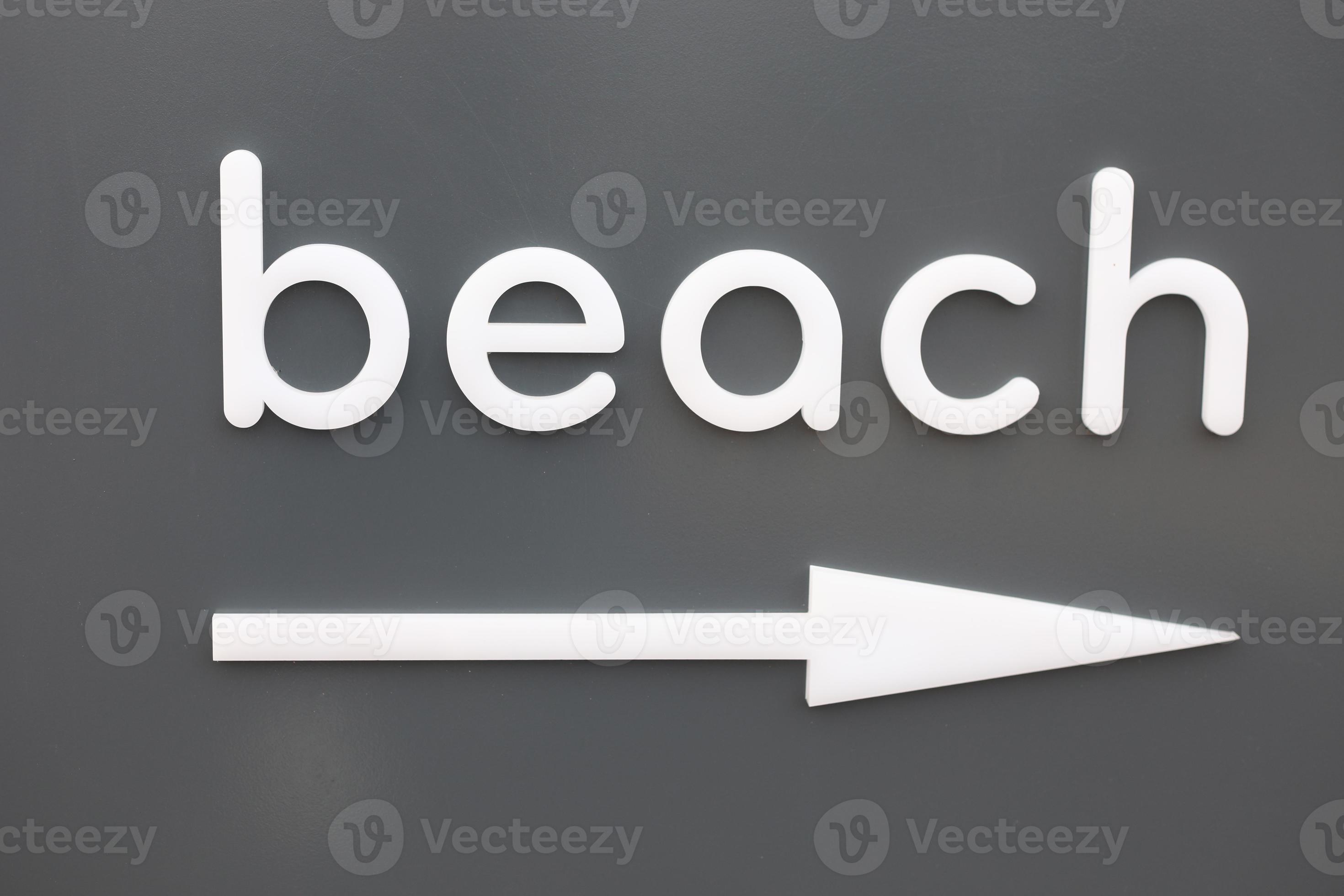 Beach sign with arrow 2197796 Stock Photo at Vecteezy