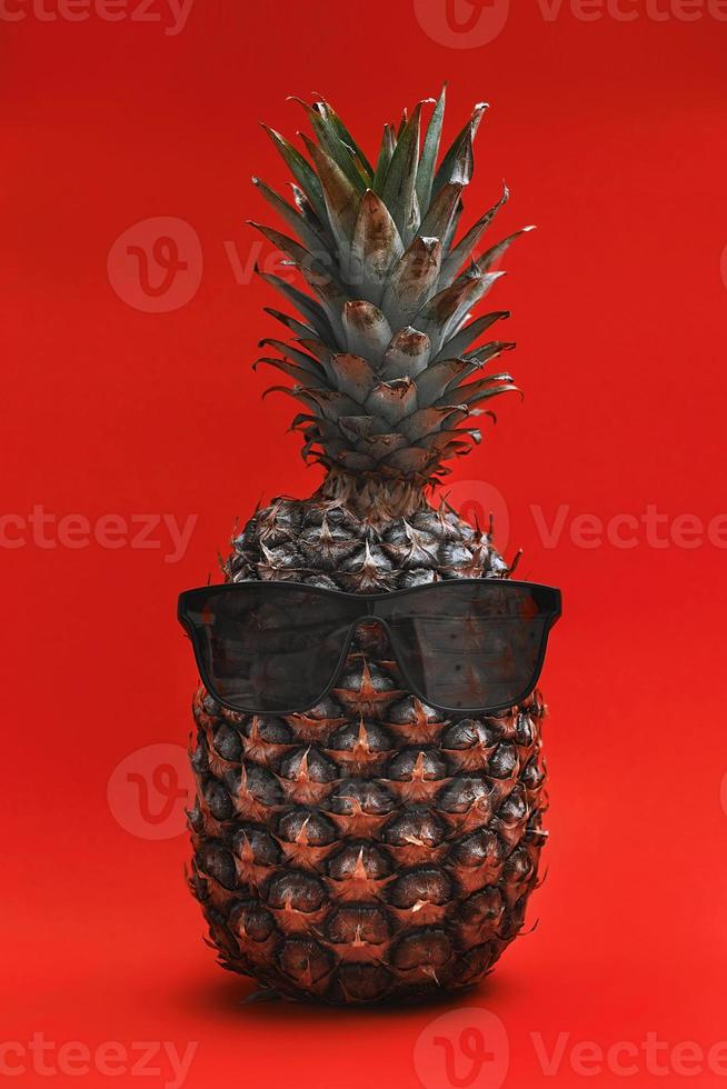 Pineapple in sunglasses photo