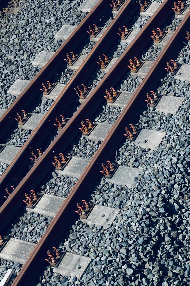 Train railroad tracks in the station photo