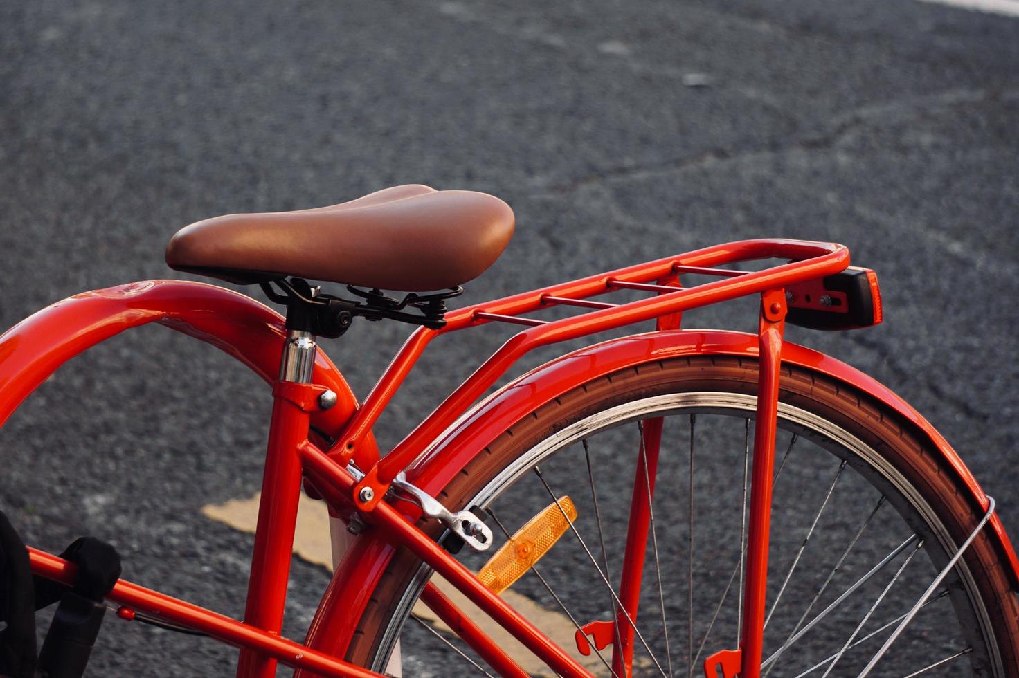 Bicycle wheel on the street photo