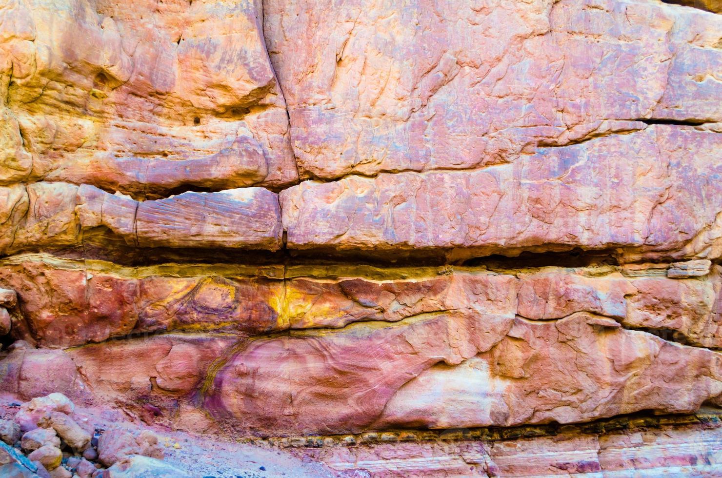 Cracked orange rock photo