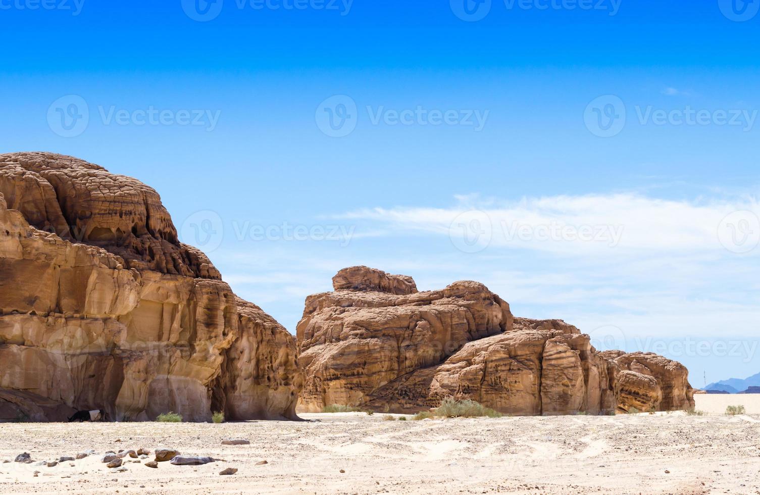 Blue sky over rocky hills photo