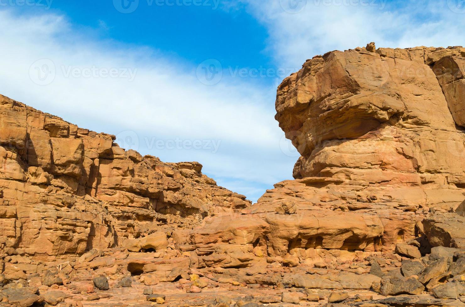 Blue sky over a rocky canyon photo