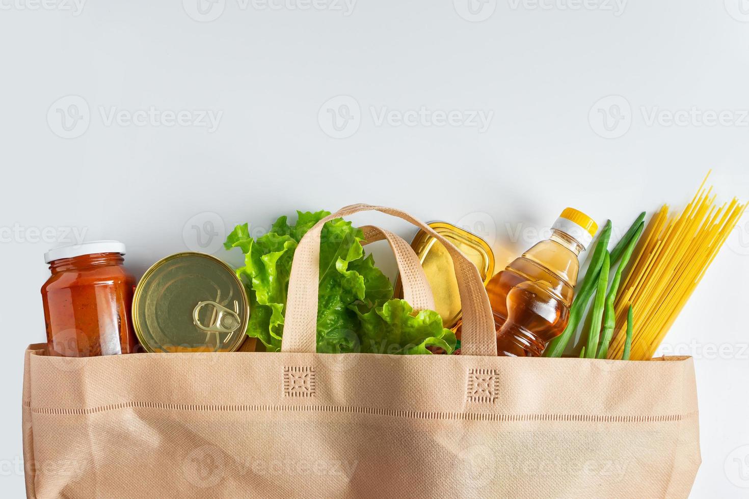 Groceries in a reusable grocery bag photo