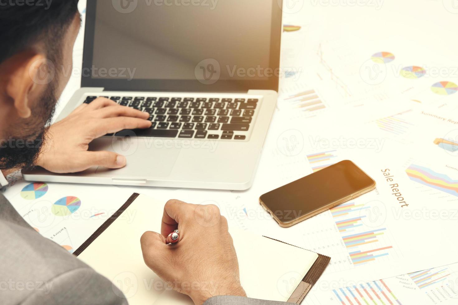Business person using a computer photo
