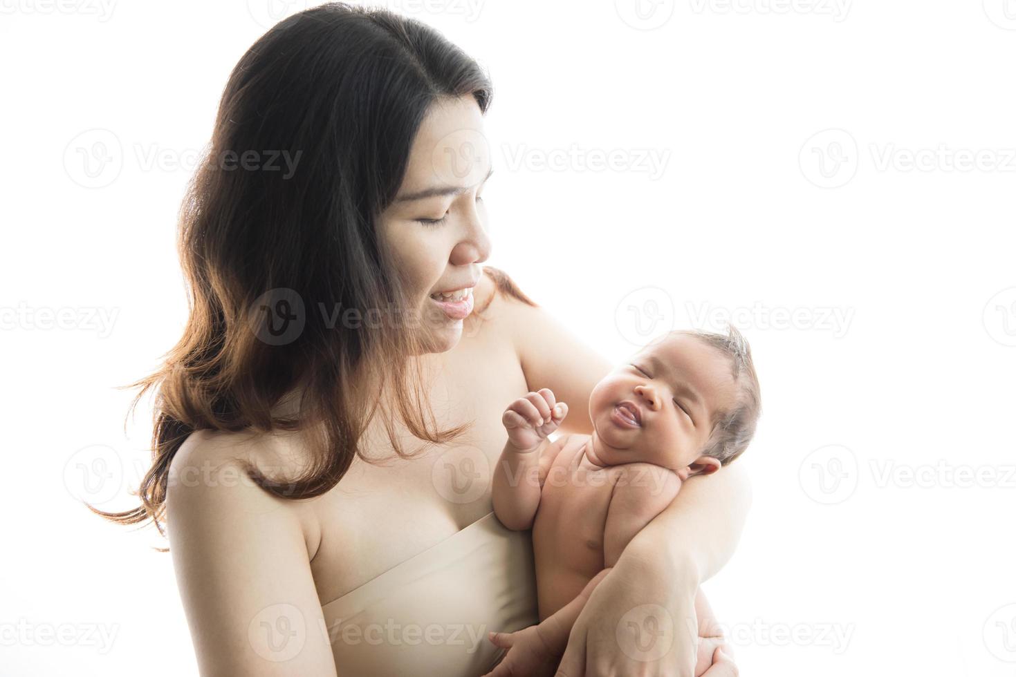 Mother and daughter on white background photo