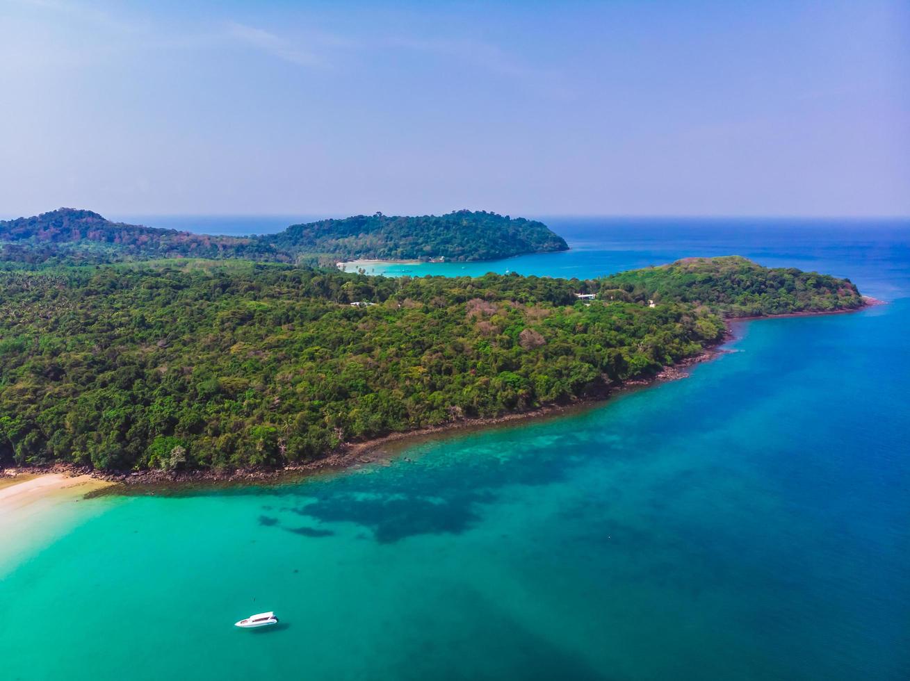 Aerial view of beautiful beach and sea with coconut palm tree photo