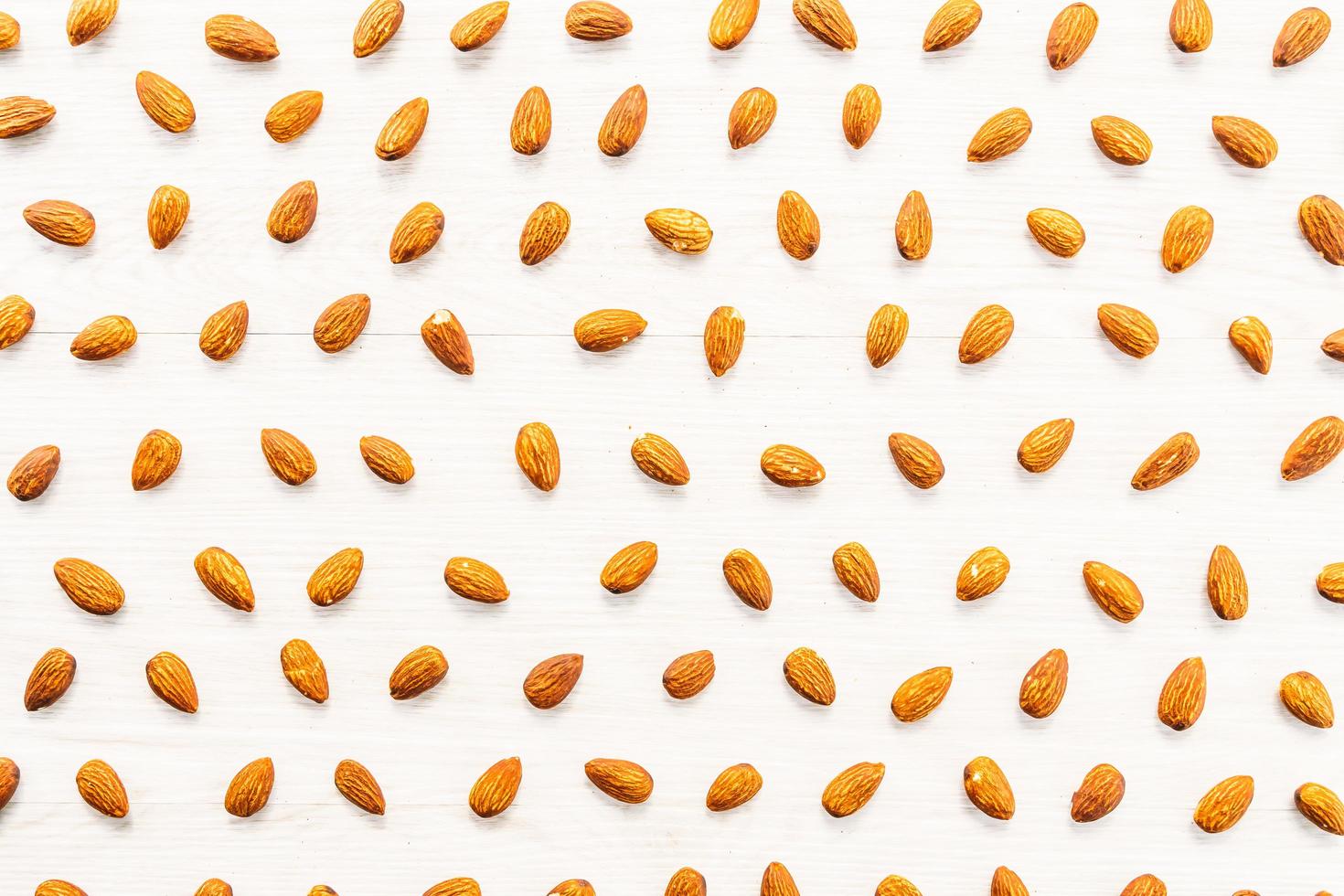 Almonds on white background photo