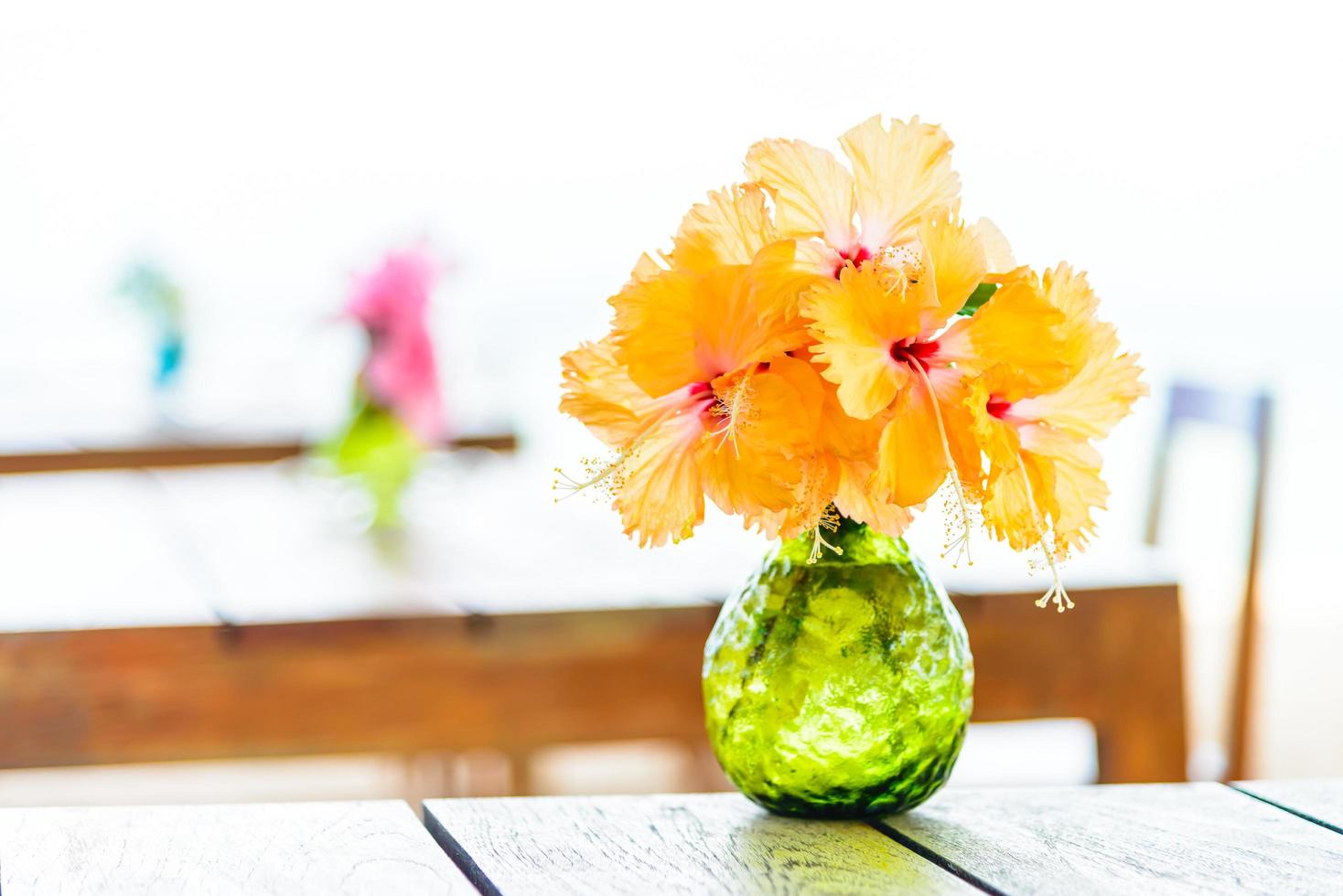 Vase on wooden table photo