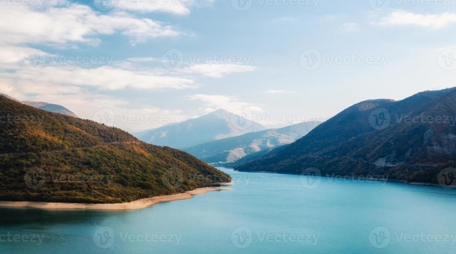 Autumn landscape of mountains and lake photo