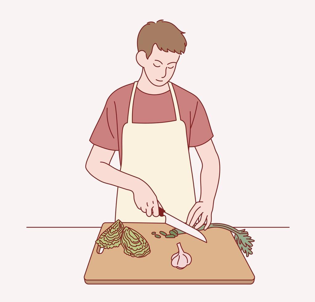 A boy is wearing an apron and cutting vegetables. vector