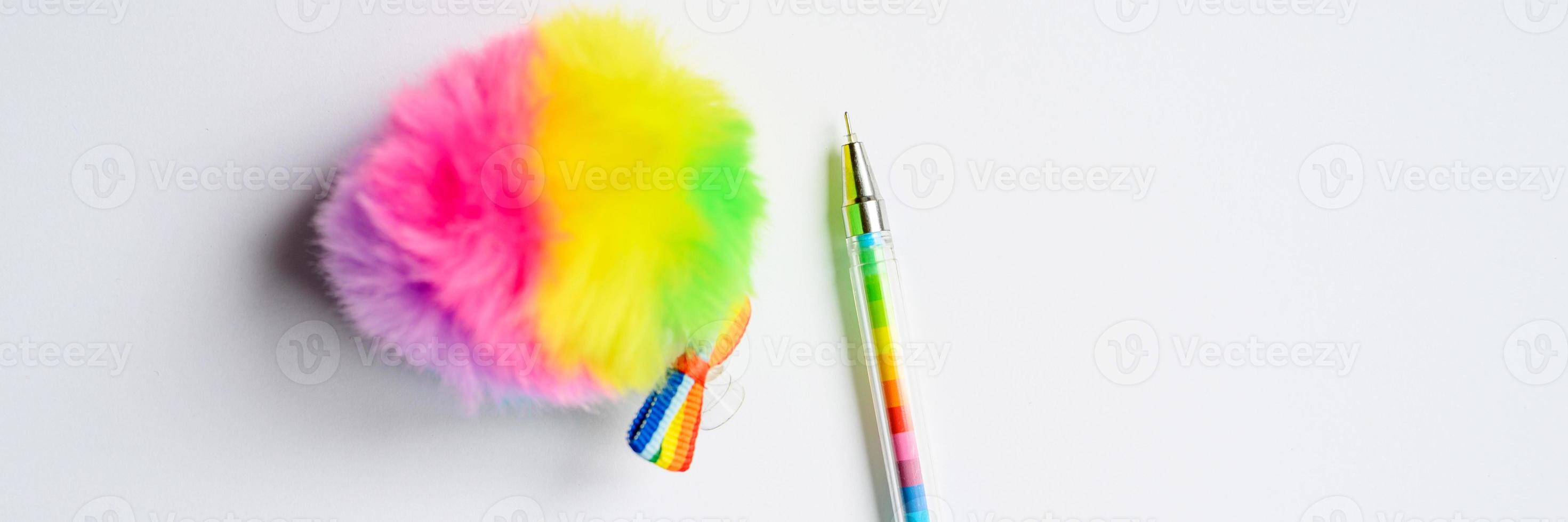 Multi-colored pen on white background photo