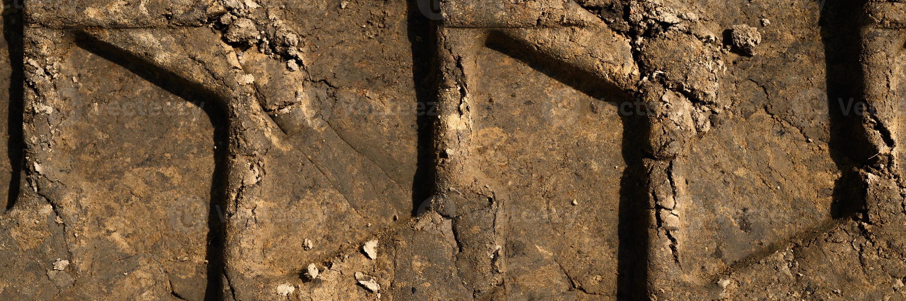 Textured surface tread of the wheel as the background, top view photo