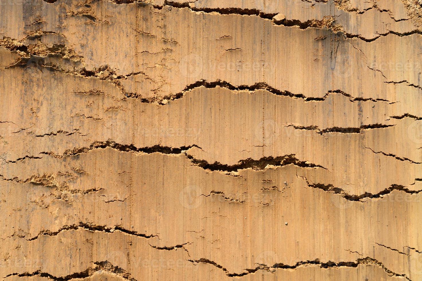 Background texture from the loose surface of the sand and earth soil photo