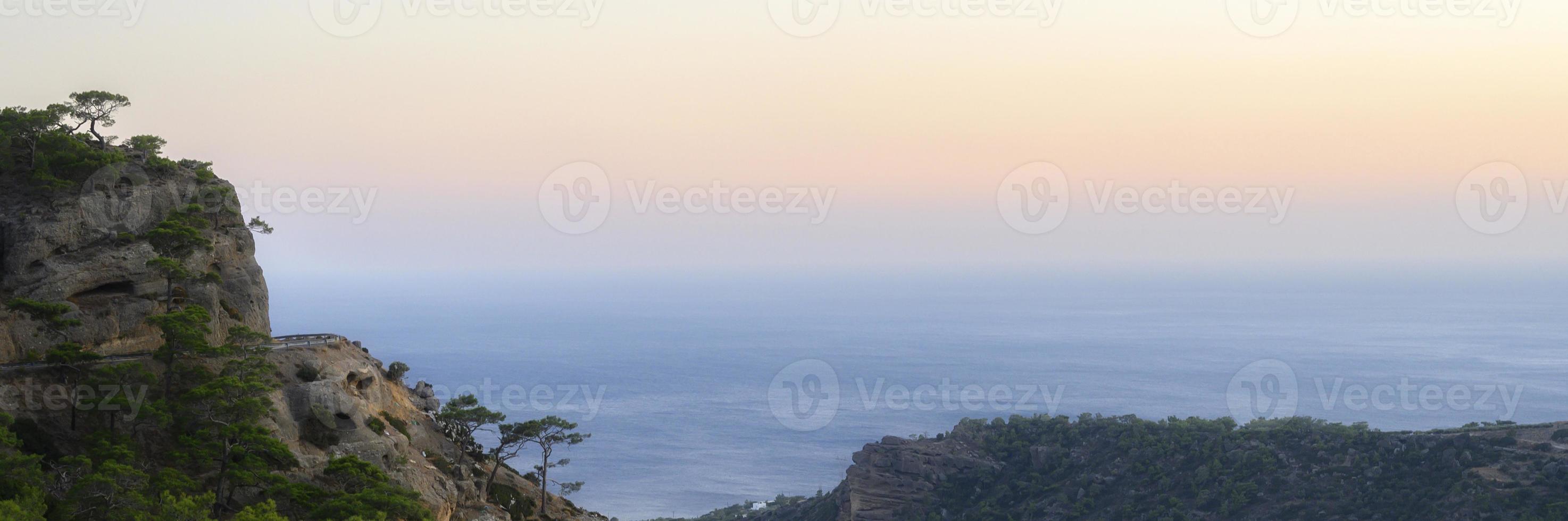 Dusk mountain landscape with views of the Mediterranean sea photo