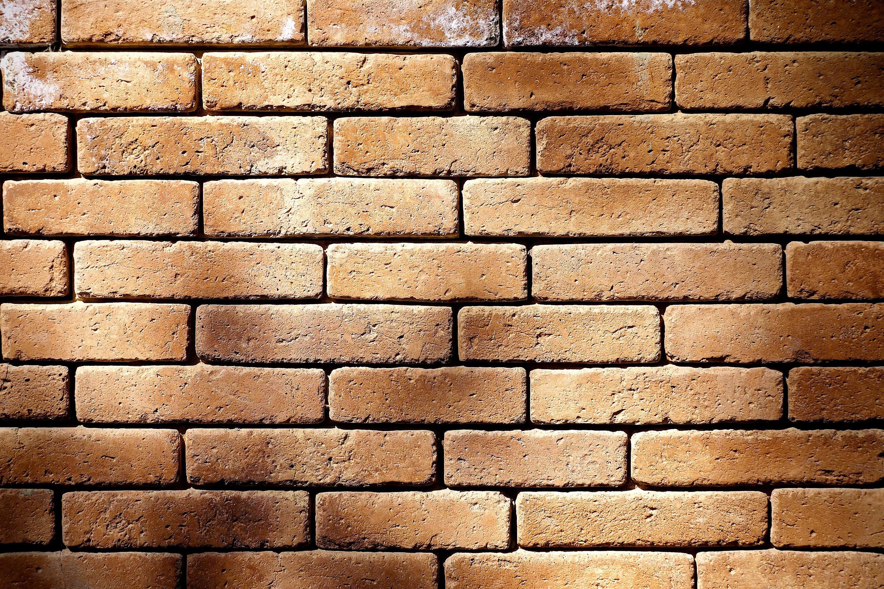 Brick wall with shadow 2212201 Stock Photo at Vecteezy