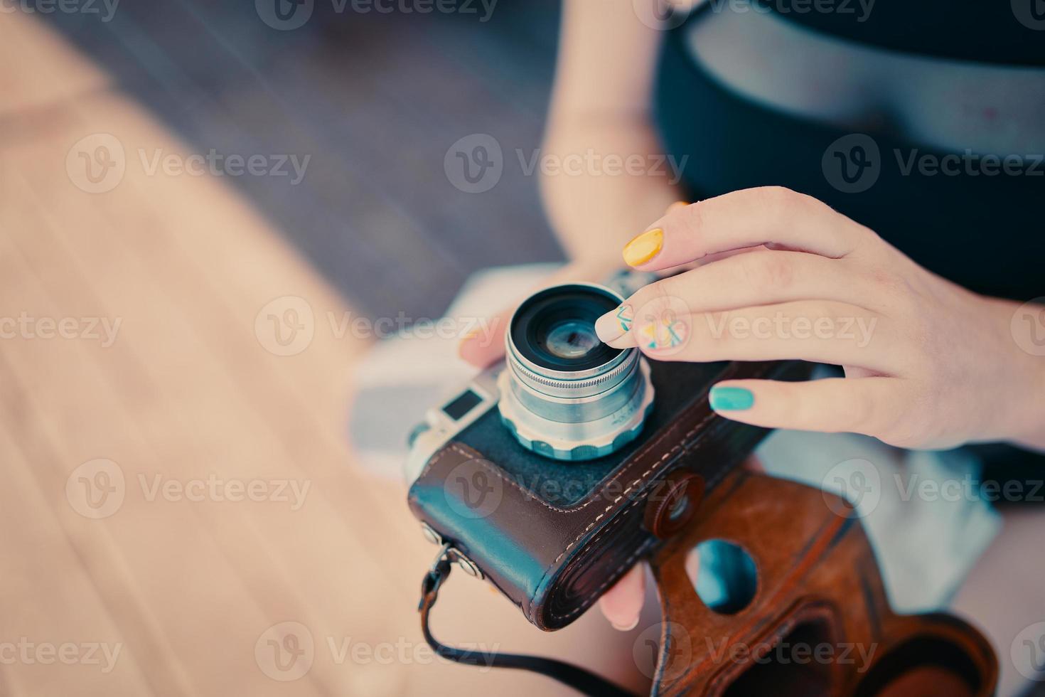 Vintage camera in hand photo